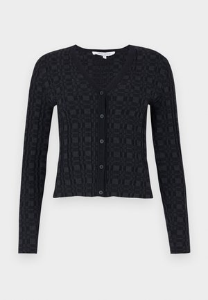 Mustardav cardigan, millede V-kaelusega, pikad varrukad ja tekstuuriga ruuduline muster, ees nupuga sulgemine ja soonikkoes äär.