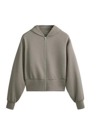 Skraćeni zip-up dukserica u prigušenoj maslinastoj zelenoj boji, izrađena od glatkog materijala, s kapuljačom, rebrastim manžetnama i detaljem sakupljenog donjeg dela.
