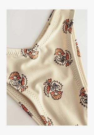 Culotte da bikini color biscotto con motivi floreali in arancione, blu e marrone. Tessuto morbido con cuciture a vista e design a vita bassa.