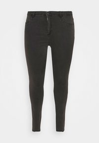 Czarne skinny jeans wykonane z denimu, z zapięciem na zamek błyskawiczny, guzikowym zapięciem i kieszeniami z przodu. Gładka tekstura z klasycznym krojem.
