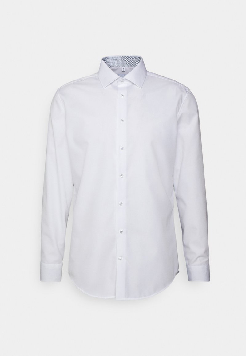 Witte lange mouwen shirt van katoen. Heeft een knopsluiting aan de voorkant, een puntige kraag en een patroon aan de binnenkant van de halslijn. Soepele textuur.