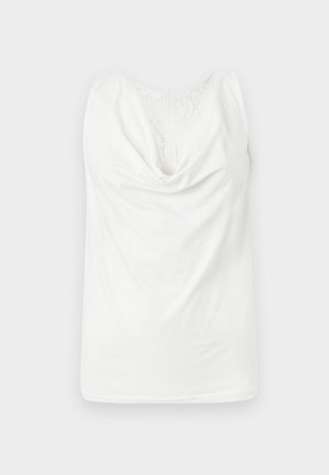 Witte mouwloze top met draperiehalslijn en kanten paneel aan de bovenkant van de borst, plat uitgestald op een lichte achtergrond.