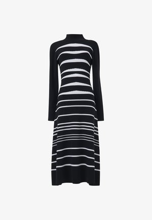 Robe midi noire à manches longues avec col montant, dotée de rayures horizontales blanches créant un motif ondulé et contourant sur le corps.