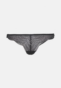 Thong en dentelle noire avec un motif floral complexe, des bords festonnés et une texture transparente, présentant un design arrière minimal.