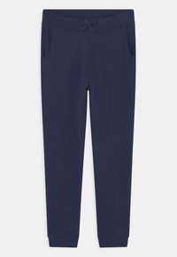 Granatowe dresy wykonane z miękkiego materiału, z elastycznym paskiem w talii ze sznurkiem, bocznymi kieszeniami i dopasowanymi mankietami.