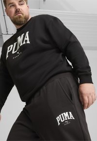 Puma SQUAD JOGGING - Trainingsbroek - black