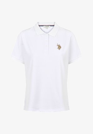 Biała koszulka polo z bawełny, z klasycznym kołnierzykiem, trzema guzikami oraz złotą haftowaną logo na piersi. Krótkie rękawy.