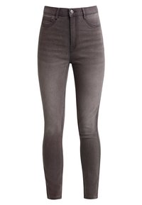 Vaqueros ajustados en un tono gris oscuro, fabricados en denim. Cuentan con cuatro bolsillos, una cremallera con cierre de botón, y una textura suave, ligeramente desvaída.