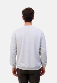 Gray sweatshirt with a textured finish, ribbed cuffs and hem, and a classic crew neck design; viewed from the back.