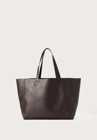 Dark brown leather tote bag with two shoulder straps and a textured surface, standing upright on a white background.