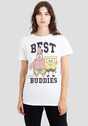 White T-shirt featuring cartoon characters SpongeBob and Patrick with the text "BEST BUDDIES" in bold black letters. Cotton material, crew neck.