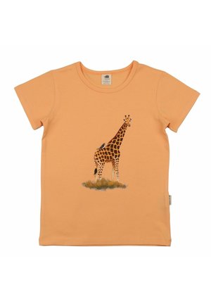 Orange short-sleeve t-shirt with a giraffe standing on grass, accompanied by two birds perched on and near its body.