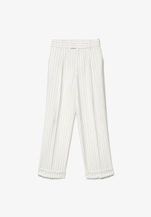 White tailored trousers with thin vertical grey stripes, pleats, cuffed hems, and belt loops visible.