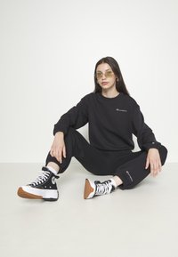 Champion Rochester ELASTIC CUFF PANTS - Treningo apatinė dalis - black