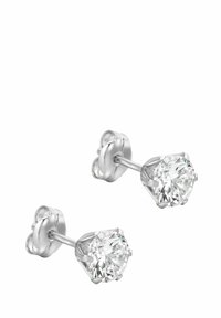 Gli orecchini a perno in argento presentano pietre rotonde in zirconia cubica trasparente sorrette da una montatura a sei griffe, con una chiusura posteriore liscia.