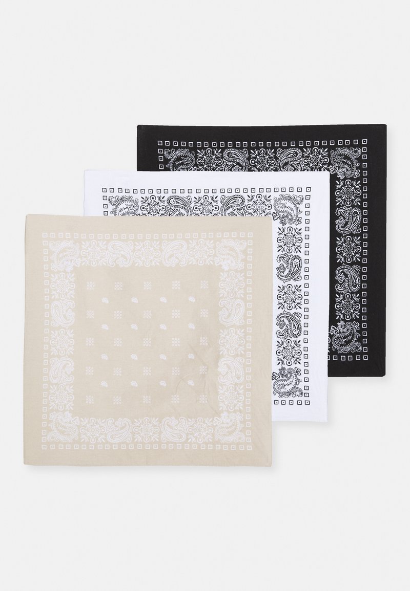 Set of three bandanas in beige, white, and black. Each features intricate paisley patterns and square borders in contrasting colors.