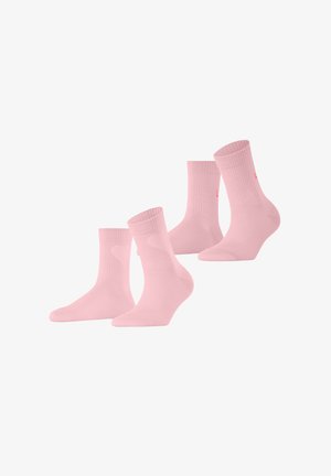 Pink crew socks in a pack of four. Made of soft material with a ribbed texture and reinforced heel. No patterns or additional accents.