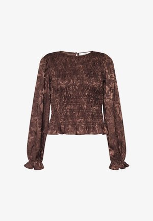 Brun blus med långa ärmar och en rynkad korsettliknande midja samt volangkant, med ett blommönster och en nyckelhålsknäppning i ryggen.