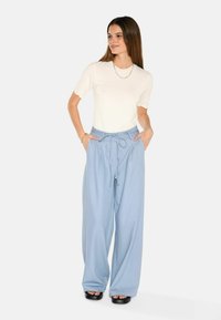 ANDRIANA - Pantaloni - blue bell