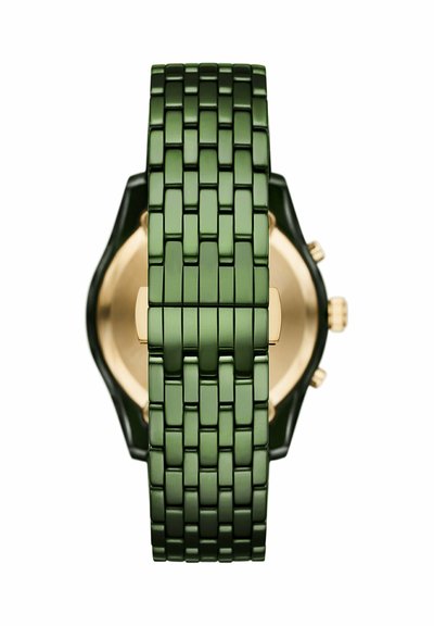 Green metal link watch band with deployment clasp, showing back of black and gold watch case with side buttons.