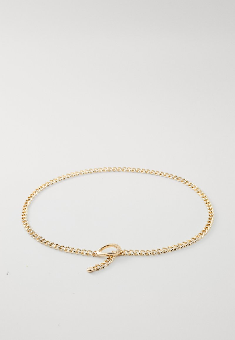 Gold chain bracelet with a smooth, reflective finish, featuring interlocking links and a secure clasp for fastening.