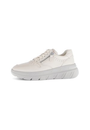 White leather sneaker with a textured gray sole, featuring a zippered detail, lace-up front, and perforated accents on the sides.