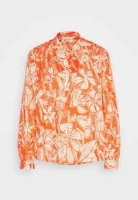 Blouse boutonnée à manches longues avec un motif floral abstrait orange et blanc et un col pointu.