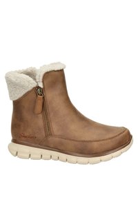Stivaletti alla caviglia in finta pelle marrone con una fodera in finta pelliccia color crema e chiusura con zip, caratterizzati da una suola flessibile color crema e dettagli di cucitura discreti.