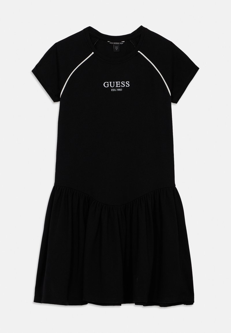 Fekete pamut ruha rövid ujjakkal, bővülő szoknyával, bordázott nyakkivágással és fehér hímzett "GUESS" logóval a felső középső részen.