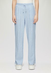Lichtblauwe gestreepte broek met een elastische tailleband en trekkoord, gemaakt van zachte stof. Slim fit met een rechte pijpontwerp.