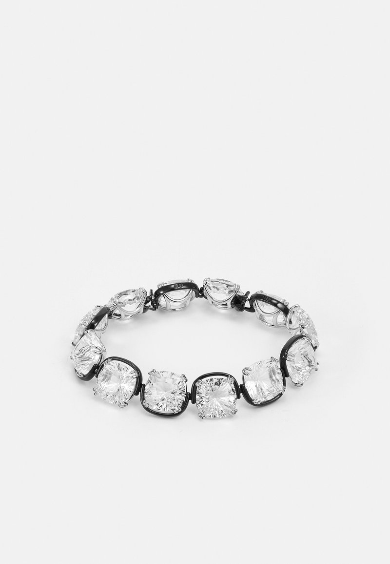 Bracelet rond avec de grandes pierres précieuses claires taillées carrées, serties dans des griffes en métal noir, disposées uniformément en cercle continu.
