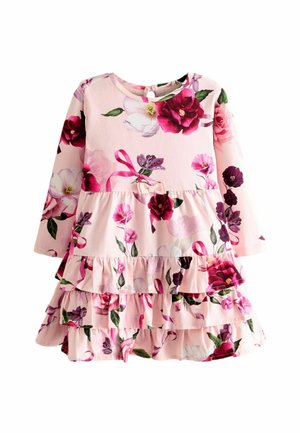Blumenkleid mit pinker Grundfarbe, langen Ärmeln und gestuften Rüschen. Verziert mit verschiedenen Blumen in Schattierungen von Pink und Rot.