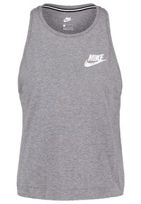 Grå Nike linne med rund halsringning och ett lätt, texturerat tyg. Inkluderar en liten vit Nike-logga på bröstet.