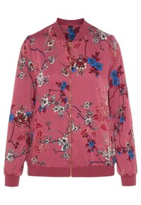 Veste bomber rose avec motifs floraux rouges et bleus, fermeture éclair dorée, poignets et col côtelés. Tissu léger avec texture lisse.