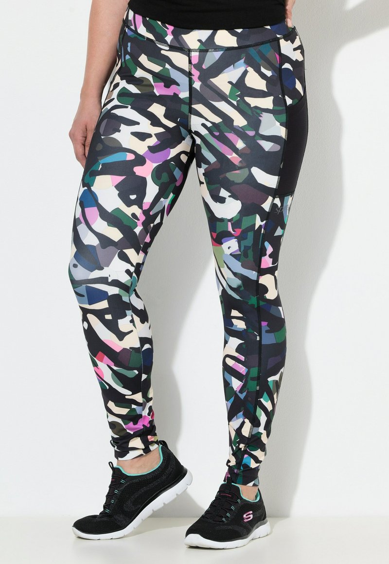 Leggings in een meerkleurig abstract camouflagepatroon met zwarte, groene, roze en blauwe tinten; rekbare stof met een hoge tailleband.