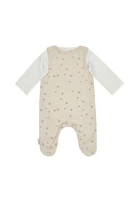 Beige Babystrampler mit langen weißen Ärmeln und einem Muster aus kleinen braunen Pfotenabdrücken, ausgestattet mit Füßchen.