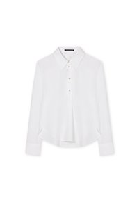 White long-sleeve shirt with a pointed collar, front button closure, and rounded hem. Made from smooth fabric with a lightweight texture.
