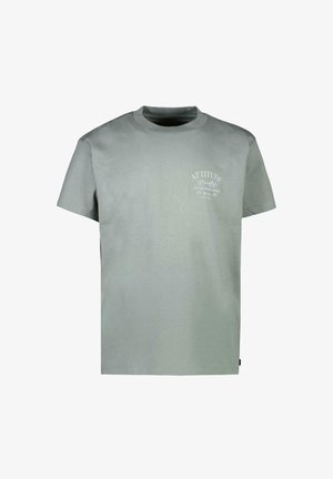 Lichtgroen katoenen T-shirt met ronde hals en korte mouwen. Voorzien van een wit gedrukt logo aan de linkerkant. Standaard pasvorm.