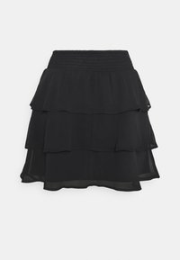 Svart lagerkjol med tre volanglager, tillverkad av lättviktsmaterial. Har en smockad midja för komfort och en aning genomskinlighet.