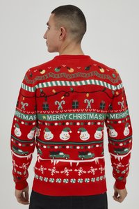Roter Weihnachtspullover mit Mustern von Schneemännern, Geschenken, Zuckerstangen und Weihnachtslichtern. Strickstoff mit gerippten Bündchen und Rundhalsausschnitt.