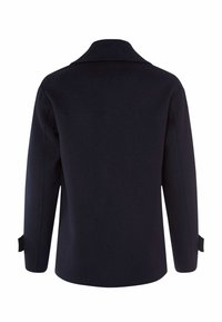 Manteau en laine bleu marine avec un col, des manches longues et des fentes sur les poignets, présentant un design simple et épuré.