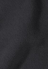 Tessuto in pile nero texturizzato con una superficie morbida e vellutata, caratterizzato da un motivo uniforme e una caduta liscia.