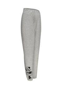 Grijze sweatpants met een elastische tailleband, met een zwart graphic van een cartoonfiguur op de onderzijde van het linkerbeen. Zachte textuur.