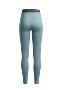 Light blue leggings made of soft fabric with a fitted design, featuring a wide dark waistband with logo accents.