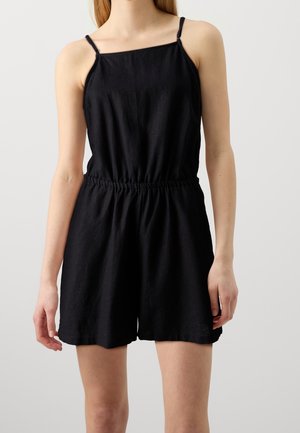 Combinaison noire sans manches avec un décolleté carré, taille élastique et coupe décontractée. Fabriquée en tissu doux et léger avec une texture lisse.