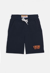 Tummansiniset puuvillasekoitteesta valmistetut shortsit, joissa on naru vyötäröllä, kaksi sivutaskua ja oranssilla brodeerattu "VINGINO BLUE JEANS" -logot.