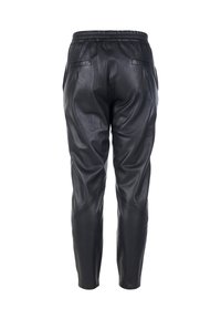 Schwarze Jogger-Hosen aus Leder mit elastischem Bund, schmal zulaufenden Beinen, Seitentaschen und dezent strukturiertem Finish.