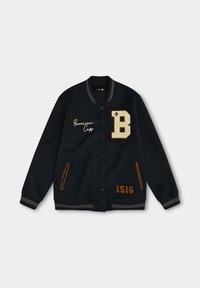 Black varsity jacket with brown-trimmed pockets, button front, "Bavarian Caps" text, a large letter B patch, and the number 1516.