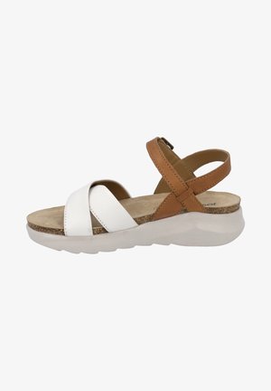 Weiße und beige Leder-Sandale mit überkreuzten Riemen, gepolsterter Innensohle und dicker weißer Laufsohle. Die Seitenansicht zeigt das verstellbare Schnallendetail.