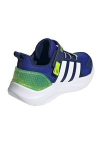 Navy athletic shoe with white stripes, mesh upper, and a green translucent heel. Features a strap and a textured, cushioned sole.